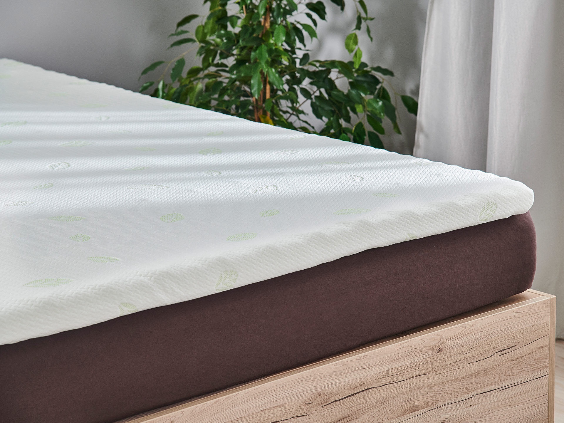 how to lower crib mattress